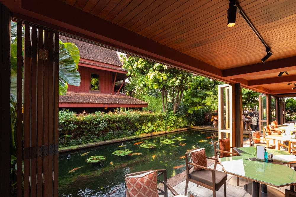 A view of Jim Thompson House in lush greenery - one of the best museums in Bangkok